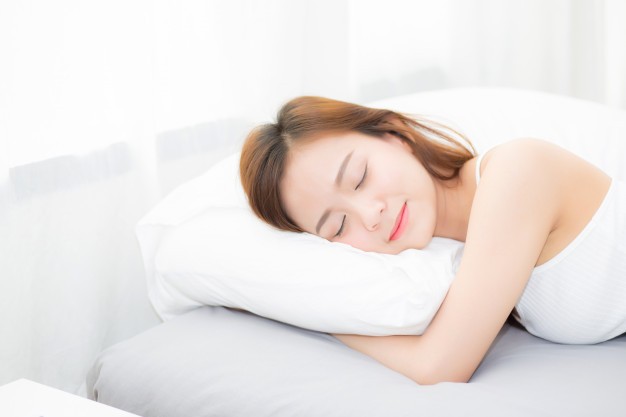 1603856467 beautiful asian young woman sleeping lying bed with head pillow 7192 1290