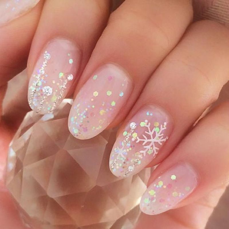 1638138788 45 trendy pink christmas nails you will love