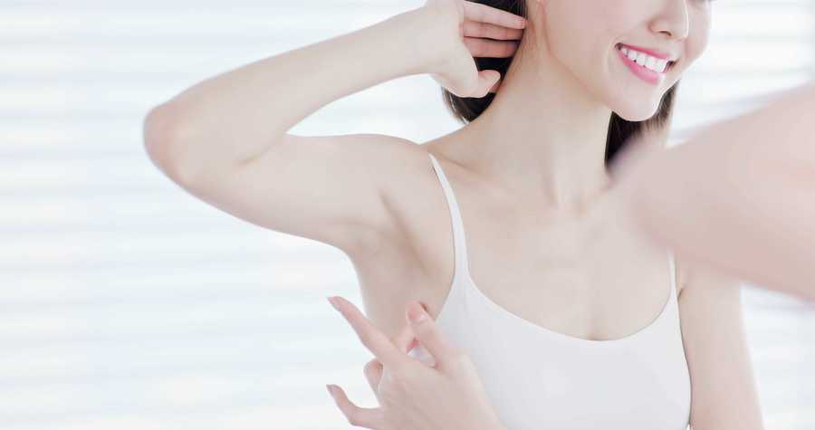 1652769023 woman smile happily with armpit royalty free image 1603175145