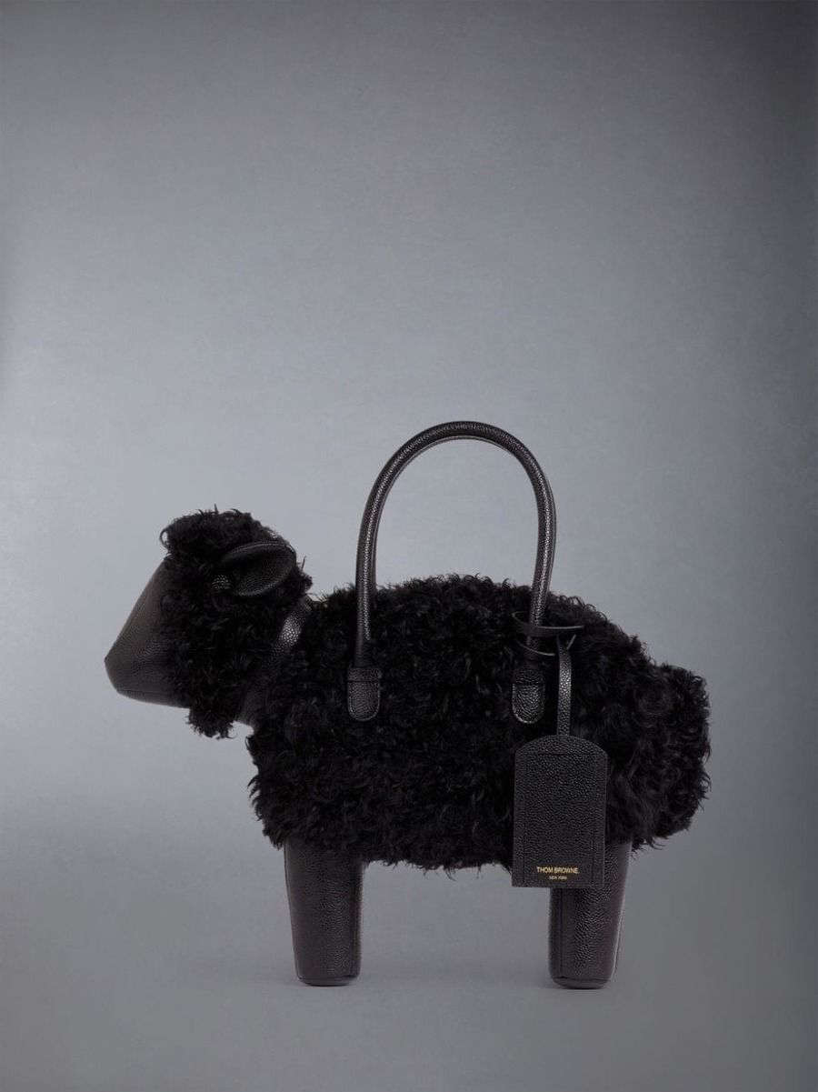 BLACK PEBBLED CALFSKIN AND LAMBSKIN COVERED SHEEP BAG