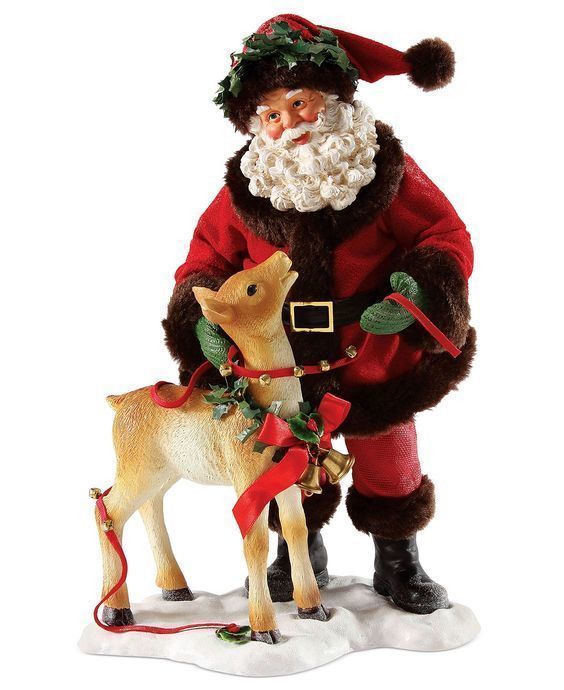1701225241 2. santa claus doll and reindeer
