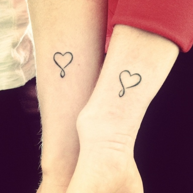 1434810580 couple heart tattoo designs on wrist