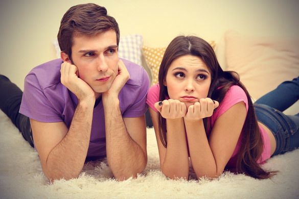 1467533081 young couple lying on carpet at home