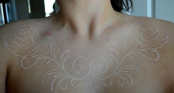 https://image.sistacafe.com/images/uploads/content_image/image/156698/1467621045-6-White-Ink-Flower-Tattoo-on-Chest.jpg