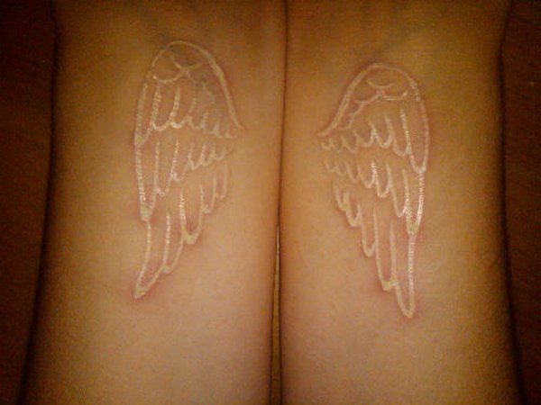 https://image.sistacafe.com/images/uploads/content_image/image/156707/1467621242-14-White-ink-wing-tattoo.jpg