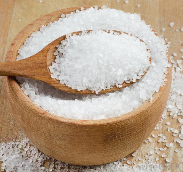 1467966233 sea salt in wooden bowl with spoon