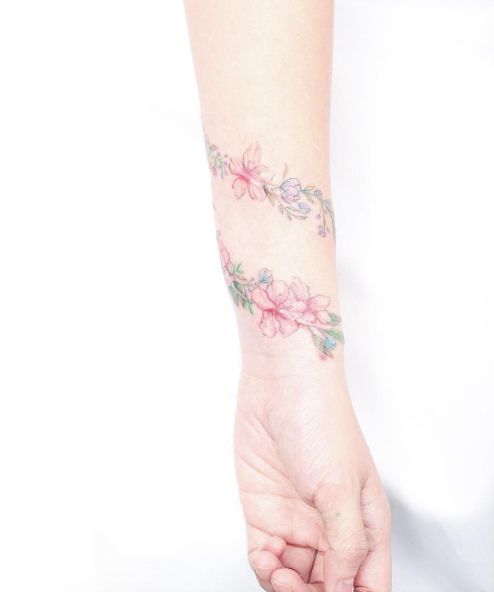 1469785170 floral wrist tattoo