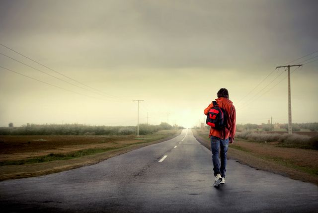1471783282 bigstock young man walking on a country 13798088