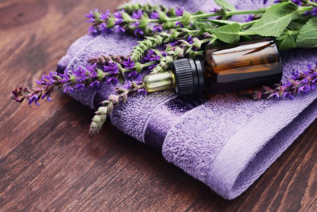 1430196194 sage oil with lavender and towel