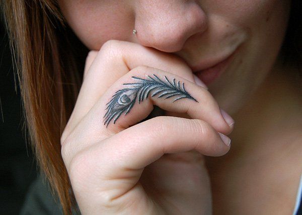 https://image.sistacafe.com/images/uploads/content_image/image/199859/1472904430-9-Peacock-finger-tattoo.jpg