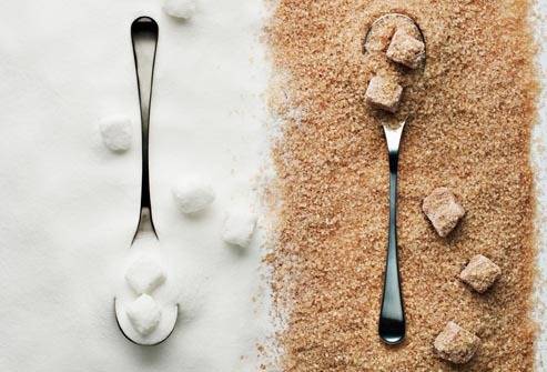1437554697 getty rf photo of processed sugar and raw sugar