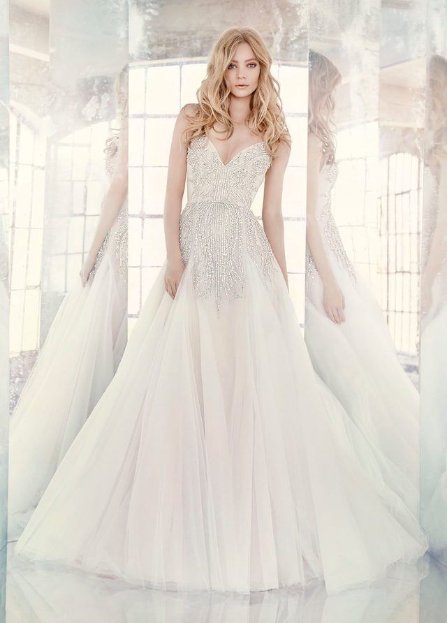 https://image.sistacafe.com/images/uploads/content_image/image/234265/1477061014-hayley-paige-bridal-tulle-modified-a-line-rhinestone-beadwork-hologram-sweetheart-beaded-full-godets-6608_lg.jpg
