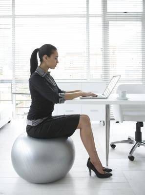 1439225848 exercise ball at a desk