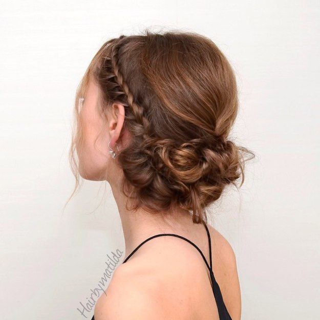 1485926190 3 low curly bun with a braid