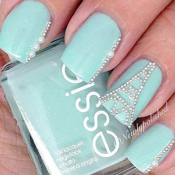 https://image.sistacafe.com/images/uploads/content_image/image/312512/1488779300-Teal-Nails-with-Eiffel-Tower-Design.jpg