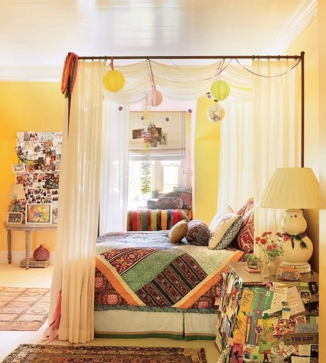 https://image.sistacafe.com/images/uploads/content_image/image/315770/1489303296-Boho-bed-with-colorful-bedding-and-simplistic-white-bed-frame-curtains.jpeg