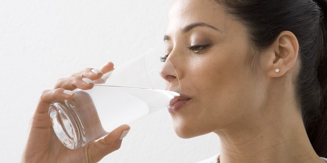 1491287070 woman drinking water
