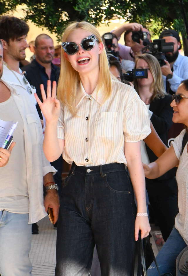 1495605925 elle fanning seen arriving at the martinez hotel in cannes during the 70th annual cannes film festival in france 160517 10