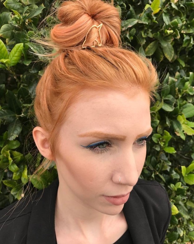 1496730732 15 ginger red high bun with unicorn clip