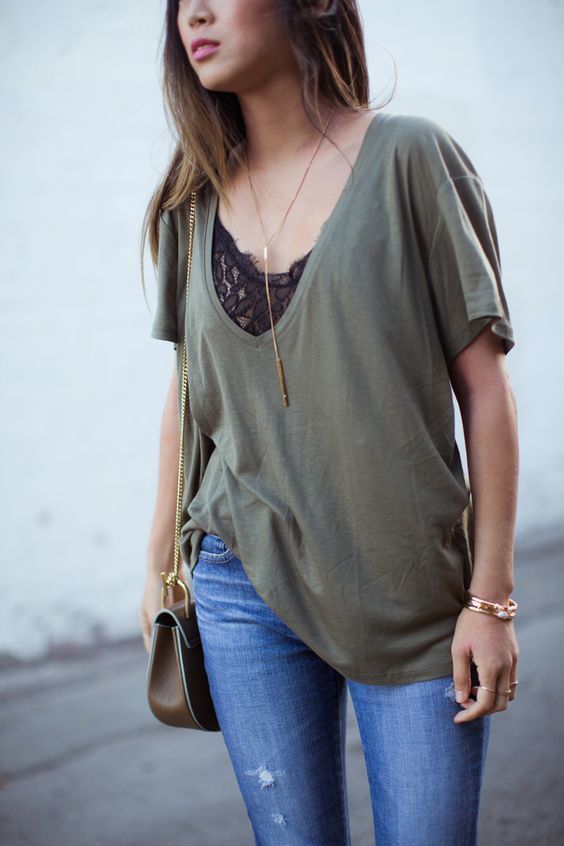 1500378338 03 a black lace bralette with an oversized olive green tee and jeans for a sexy casual look