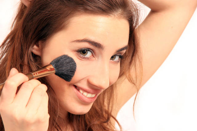 1444018494 bigstock young happy woman with make up 17070140