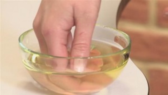 1428581056 how to do an olive oil hair treatment.wideplayer 300x169