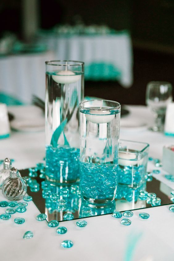 1507271176 teal glass pebbles candle centerpiece