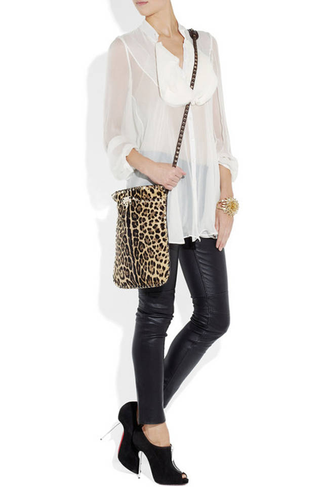 1444802596 rockstud leopard print calf hair shoulder bag by valentino on model