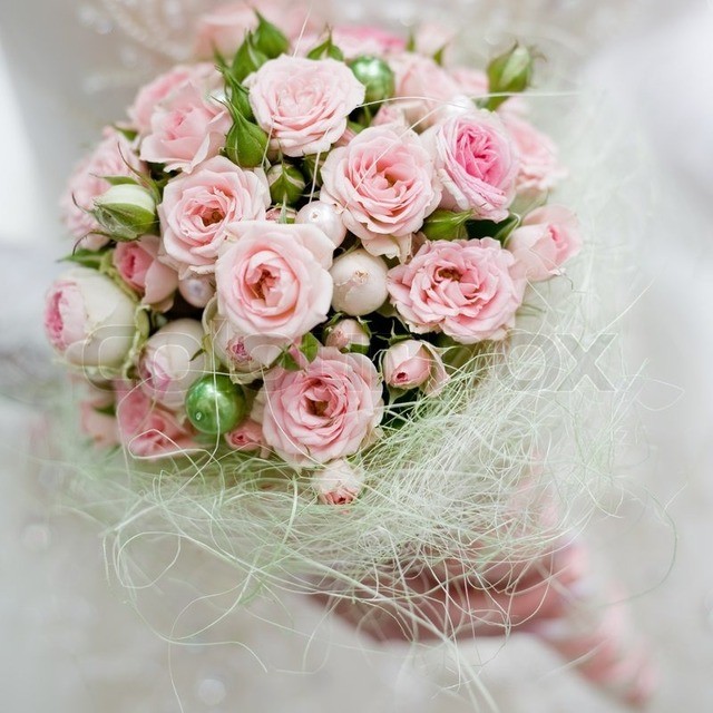 1509201319 2558136 wedding bouquet with pink roses in bride hand