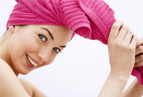 1445826107 photolibrary rf photo of woman towel drying hair