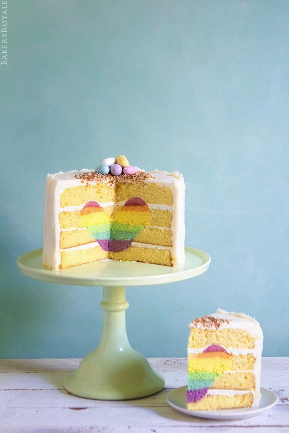 1515992856 surprise inside rainbow heart cake via bakers royale2