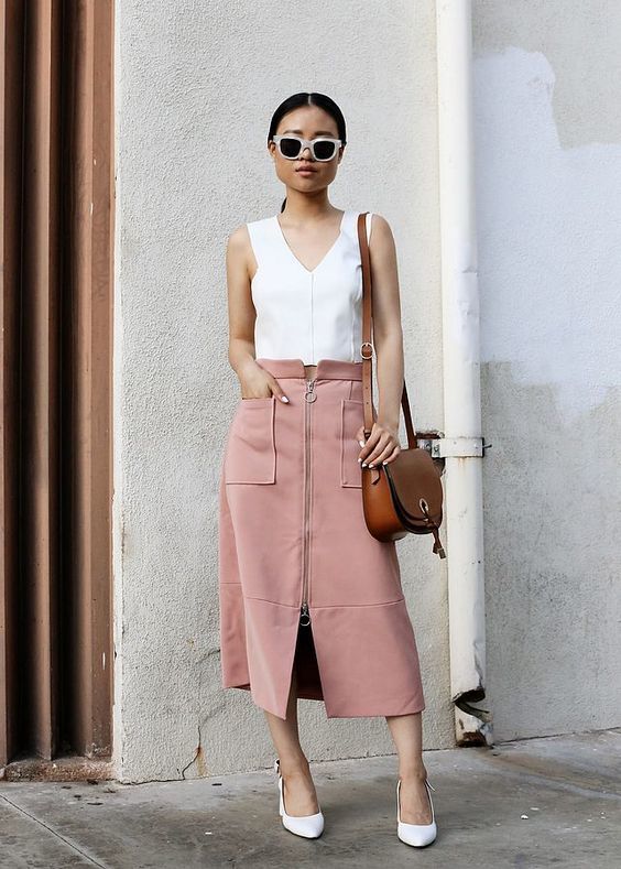 1516544220 08 a white strap top a pink zip skirt with pockets and white shoes