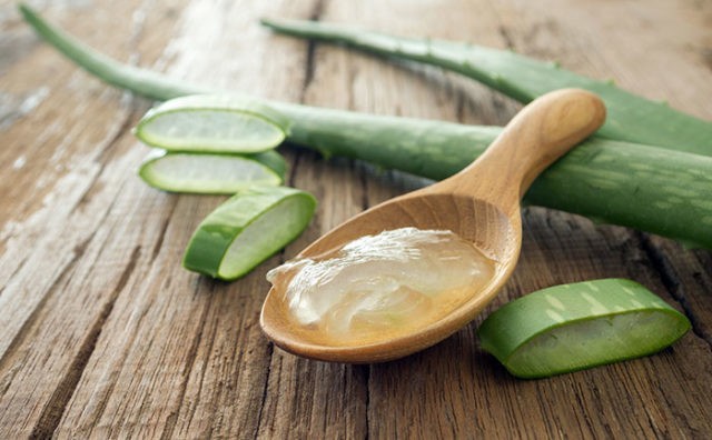 1516696232 hh aloe vera gel wooden spoon 640x396