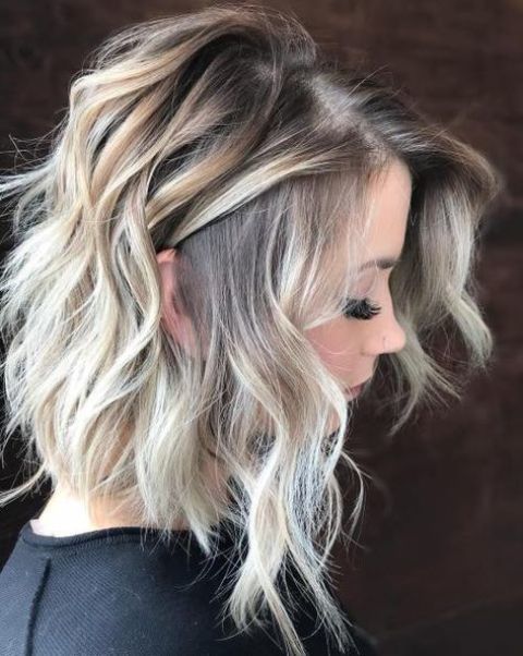 1516759501 05 medium layered bob haircut with blonde balayage on light brunette hair