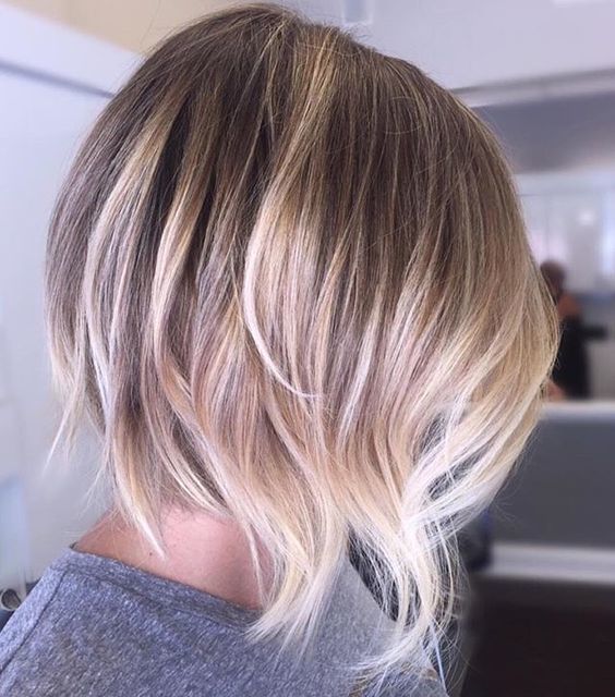 1516759527 06 short shaggy bob haircut with a brown base and blonde balayage to make the look bolder