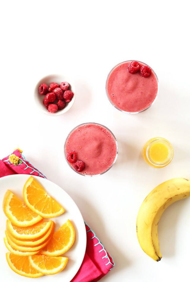 1523767383 summer in a cup smoothie raspberries banana oj pom juice and almond milk vegan glutenfree