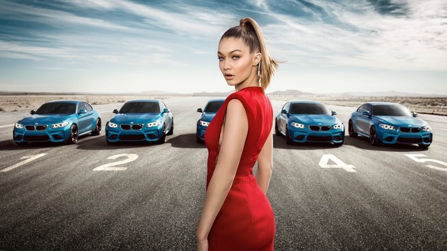 1530599138 gigi hadid red dress and blue bmw cars in desert