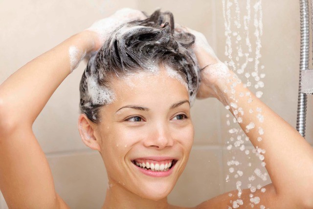1541753379 sudsy woman shower shampoo