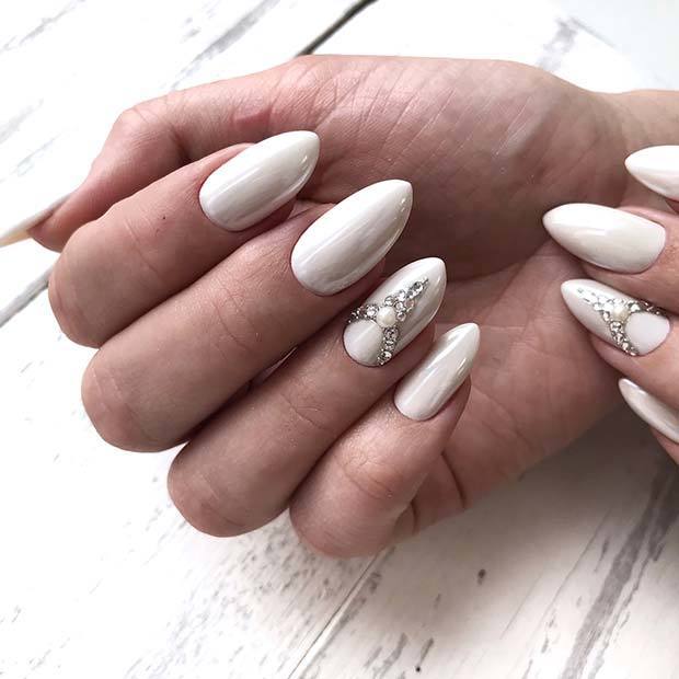 1550209349 white nails with sparkly pearl accent nail