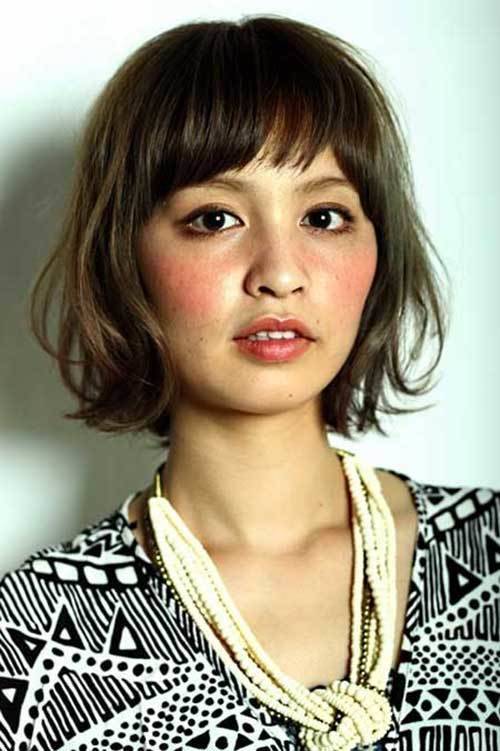 1454042053 cute bob with bangs for oval faces