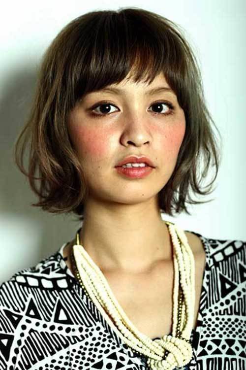1454042056 cute bob with bangs for oval faces