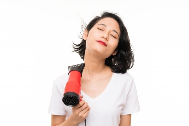 1562723485 asian young woman with hairdryer 1368 38487