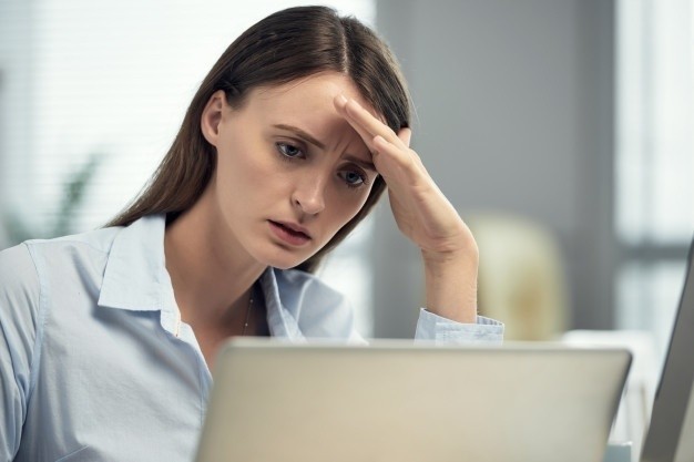 1569421504 stressed caucasian woman sitting office front laptop 1098 17810