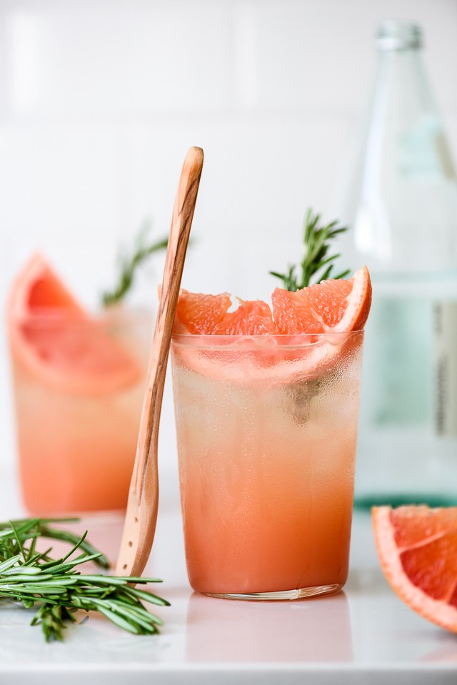 1584078532 honey rosemary grapefruit sodas homemade syrup fork knife swoon 01