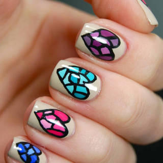 1453807677 1450433603 stained glass heart nail art