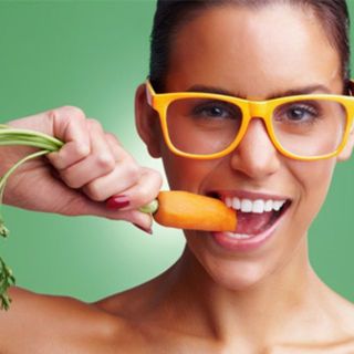 1474273427 woman eating carrot horiz aju2g1