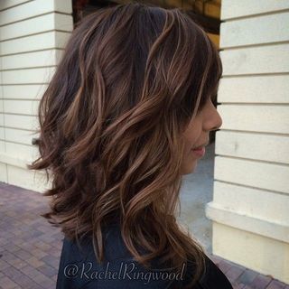 1476850763 7 medium length wavy brunette balayage hair