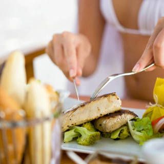 1573466162 1439439799 woman eating fish