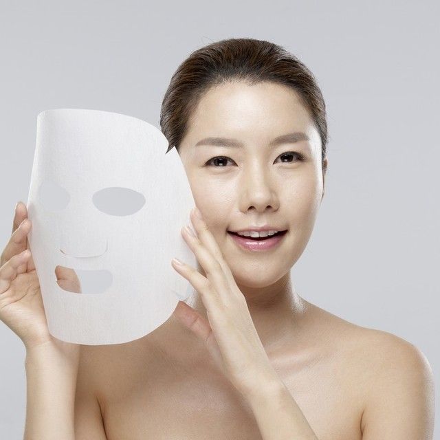 Chinese girl use facial mask
