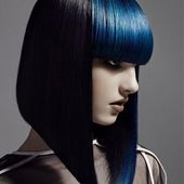 Icon sharp bob contrasts with blunt electric blue fringe